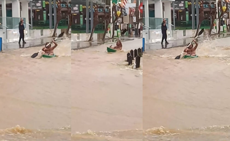 Το βΙντεο που ε&gamma ;ινε viral: Βγorκε με κανo στους πλημμυ ρισμéνους δρόμους του Πρωταρà!