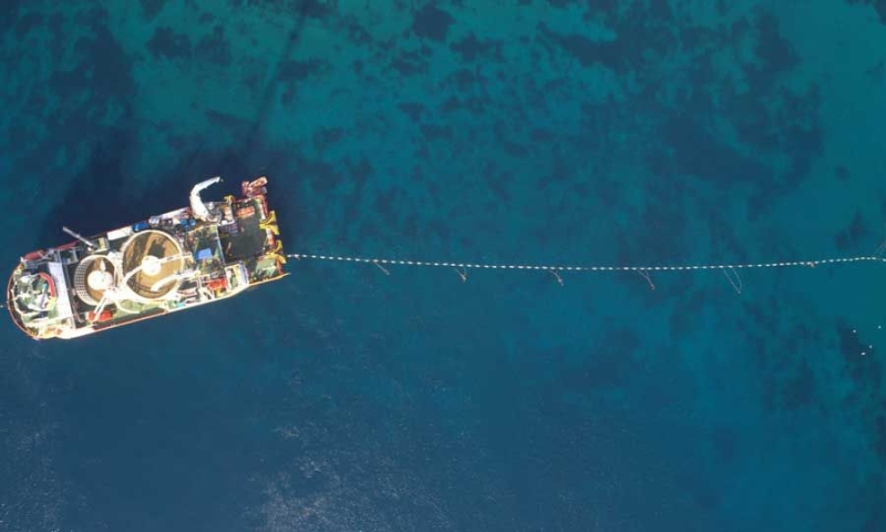 Πιοτηδσδεσ Κρτς τηνΚyρο /></p>
<p> Cyprus has committed to its equity participation in the Great Sea Interconnector project, setting as a prerequisite the reconfirmation of its viability, through a new cost-benefit study. </p>
<p><em><strong>Chrysa Liangou</strong></em></p>
<p>Cracks of light are visible in the new impasse that has arisen with the implementation of the Crete-Cyprus interconnection and after the ADMIE was appointed as the implementing body and project promoter of the project, which was renamed the Great Sea Interconnector.</p>
<p>A series of prerequisites in order to “unlock” the funding seem to be on track and finalized in May. ADMIE is expected to request a meeting from the Cypriot government to present to it within the month the first results of the cost-benefit study of the interconnection, which according to information are positive.</p>
<p>The EIB will review its decision to finance the project with 500 million euros. </p>
<p>The results of the study are estimated to pave the way for the participation of the Republic of Cyprus in the share capital of the Great Sea Interconnector and its financing with an amount of up to 100 million euros from the Recovery Fund. Cyprus has been committed since February for its equity participation in the project, setting as a prerequisite the reconfirmation of its viability, through a new cost-benefit study which it was initially going to do last autumn, but finally referred it to ADMIE.</p>
<p>The same study will be the “key” for the financing of the project by the EIB, with which ADMIE is in technical discussions. The EIB will review its decision to finance the project with 500 million euros, which it had rejected during the period under the control of the Cypriot businessman Savvas Ktoridis, evaluating the first positive elements of the new cost-benefit study and on the side of ADMIE there is optimism about the result.</p>
<p>Meanwhile, the plenary session of the competent energy authority (RAAEF) is expected to approve tomorrow the revenue methodology of the project proposed by ADMIE with minor variations. ADMIE has recommended amortization of the total construction cost of the interconnection amounting to 1.9 billion euros over 25 years, with RAAEF reportedly extending the period to 35 to 37 years to limit the burden on consumers.</p>
<p> < p>It should be noted that the cost of the project will be recovered from the consumers of Greece and Cyprus through network usage fees at a ratio of 37%-63% respectively, as already agreed.</p>
<p>RAAEF is said to be accepting and the administrator's proposal to cover possible geopolitical risk – that is, consumers should continue to pay fees in case of delays caused by a geopolitical obstacle, which cannot be excluded in the sensitive transit zone of the electric cable.</p>
<p>With the approval of the revenue methodology by the FSA tomorrow, it closes an important prerequisite for the financing of the project by commercial banks. What remains is the approval of the common revenue recovery methodology proposed by ADMIE and by the Cyprus Energy Regulatory Authority (CERA), which according to information reportedly questions the need for a new methodology, referring to the methodology it approved by its decision in 2023. CERA also allegedly does not accept ADMIE's request for a common revenue recovery methodology from the Regulatory Authorities of Greece and Cyprus, which for ADMIE is considered necessary to ensure the smooth flow of revenue on an annual basis and, respectively, payments to suppliers and contractors.</p>
<p>For ADMIE, securing the regulatory framework, which in this case means the approval by the regulatory authorities of the two countries of the common methodology it has proposed, is necessary for the commercial banks to open lines of credit, as was found in the first strikes it made for financing. </p>
<p>Pending the decisions of the regulatory authorities and the Cypriot government, ADMIE has stopped payments to counterparties, with the French Nexans that has undertaken the construction of the cable raising the issue of work stoppage. After a first unofficial warning before Easter, Nexans in an official letter informed the ADMIE two days ago that if it is not paid the installment of the outstanding April and the following May, on June 1st it will proceed with a suspension of production of the submarine cable.</p>
<p>The developments are closely monitored by the E.U. which has approved €657 million in funding for the project. In a teleconference held before Easter with the involved agencies of Greece and Cyprus, DG Energy asked for the acceleration of the procedures to unblock the emblematic interconnection, which will bring Cyprus out of energy isolation.</p>
</p>
<p><noindex></p>
<div class=